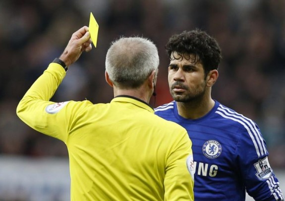455428-chelseas-diego-costa-r-is-shown-a-yellow-card-by-the-referee-martin-at